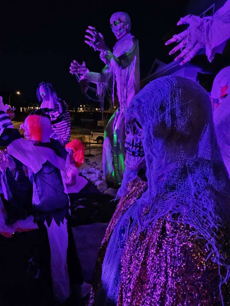 Haunted house scenes with skeletons, clowns and ghouls