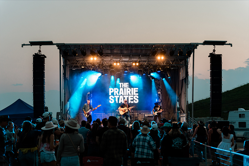 Sunset over the crowd at Bow Valley Boot Stomp